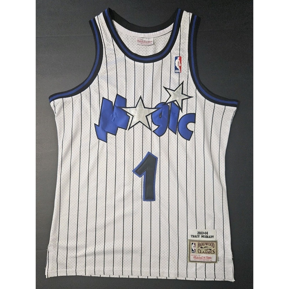Mitchell & Ness Men's Tracy McGrady Orlando Magic Hardwood Classics Jersey...